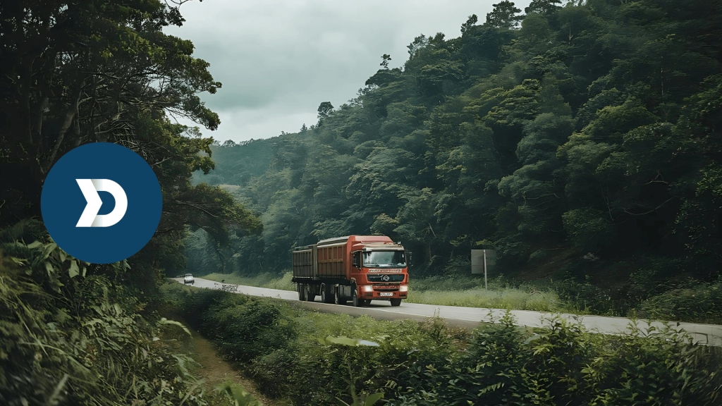 Truck driving on a scenic forest road, representing sustainable fleet operations with Damoov's mobile telematics.