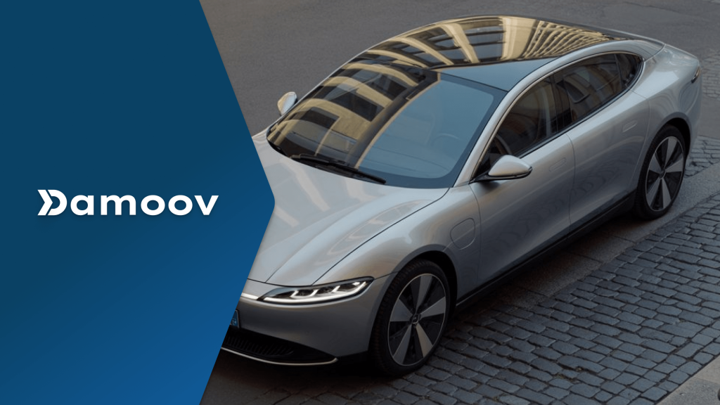 Electric vehicle parked on cobblestone street, illustrating how mobile telematics analyzes driver behavior metrics for insurance and fleet risk models.