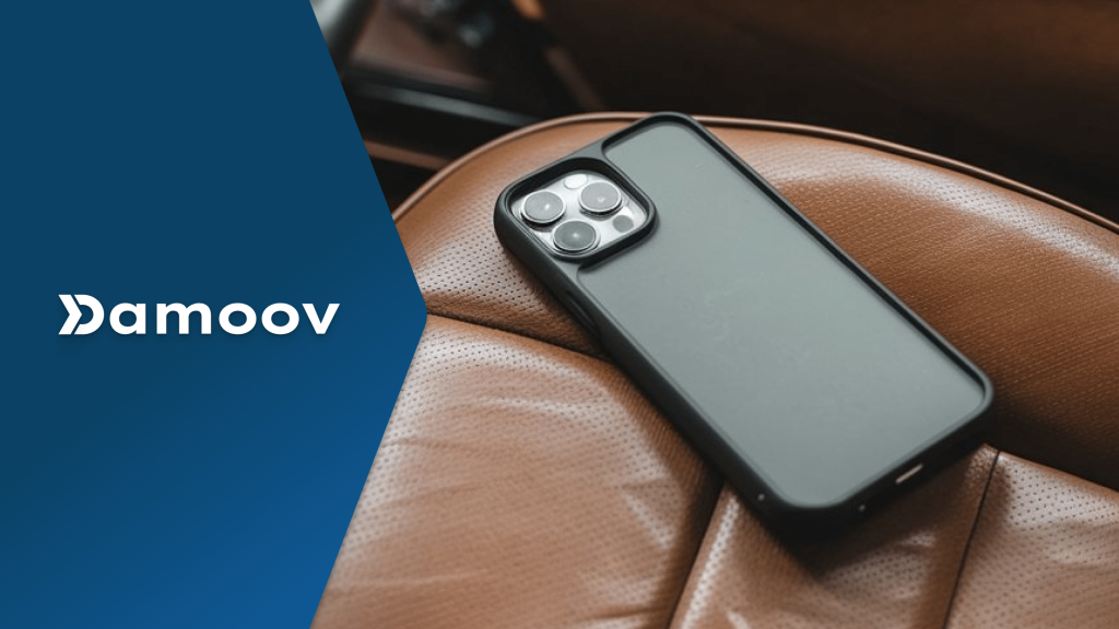 Smartphone on car seat representing mobile telematics and driver behavior data collection via phone sensors.