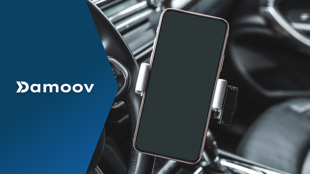 Smartphone mounted on a car dashboard using a holder, illustrating app-based mobile telematics technology for driver behavior tracking.